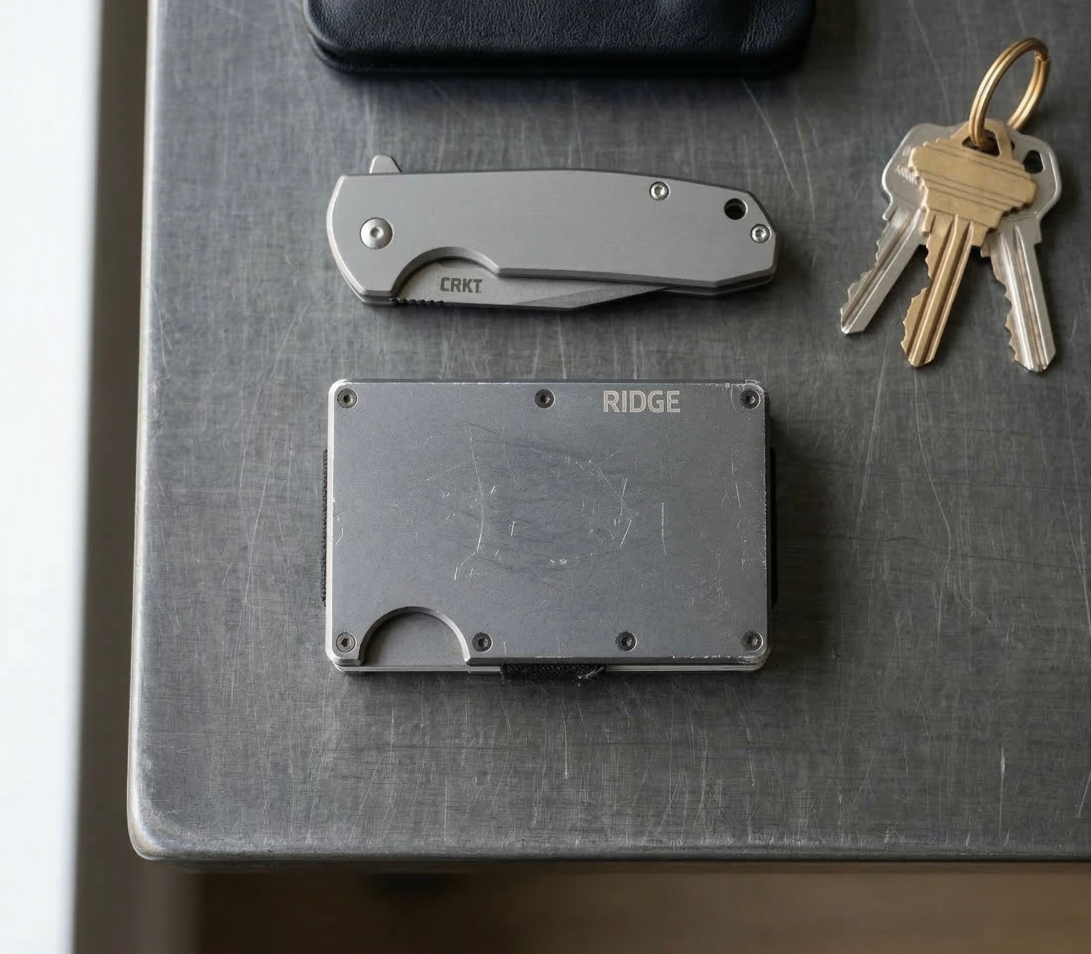 Ridge Wallet Aluminum with cards partially exposed